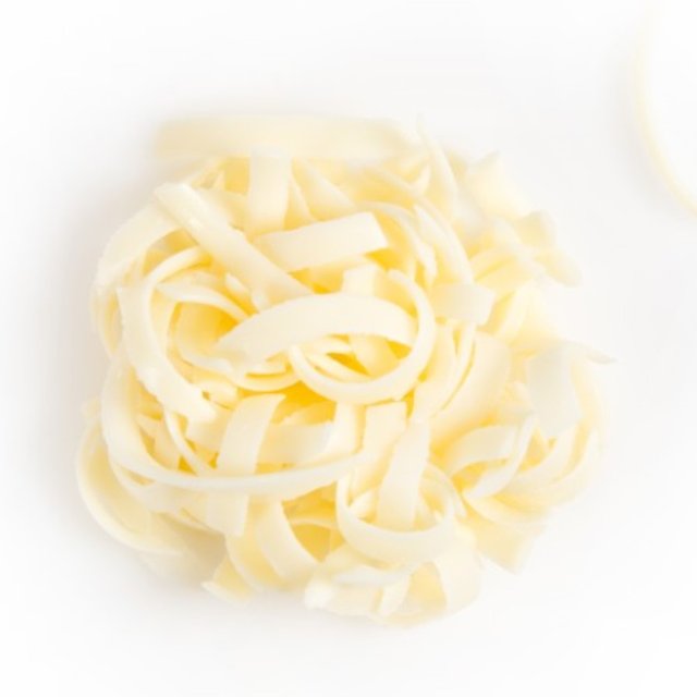 Obrázek produktu Čokoládové špagety bílé 2,5kg DOBLA